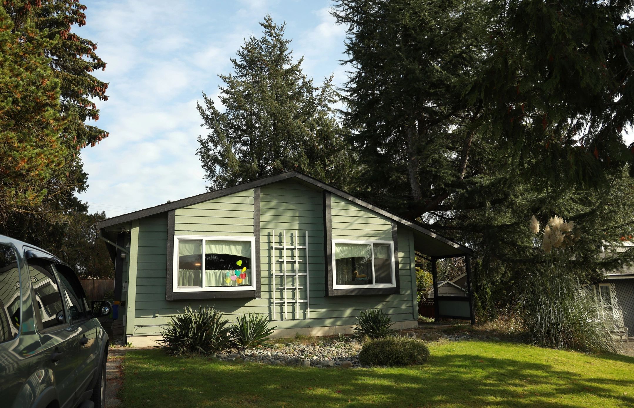 Residential front elevation with installed windows