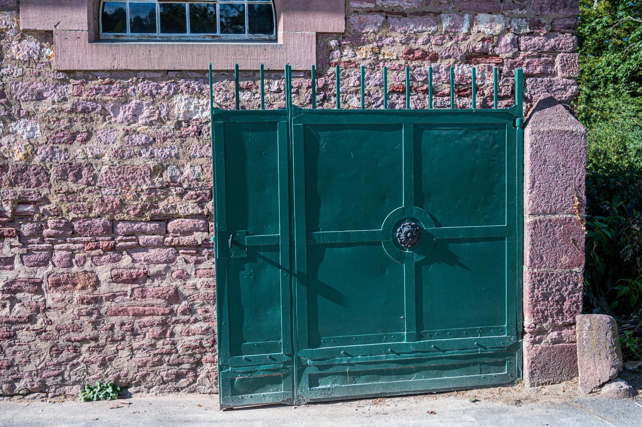 Blue exterior gate and entry door