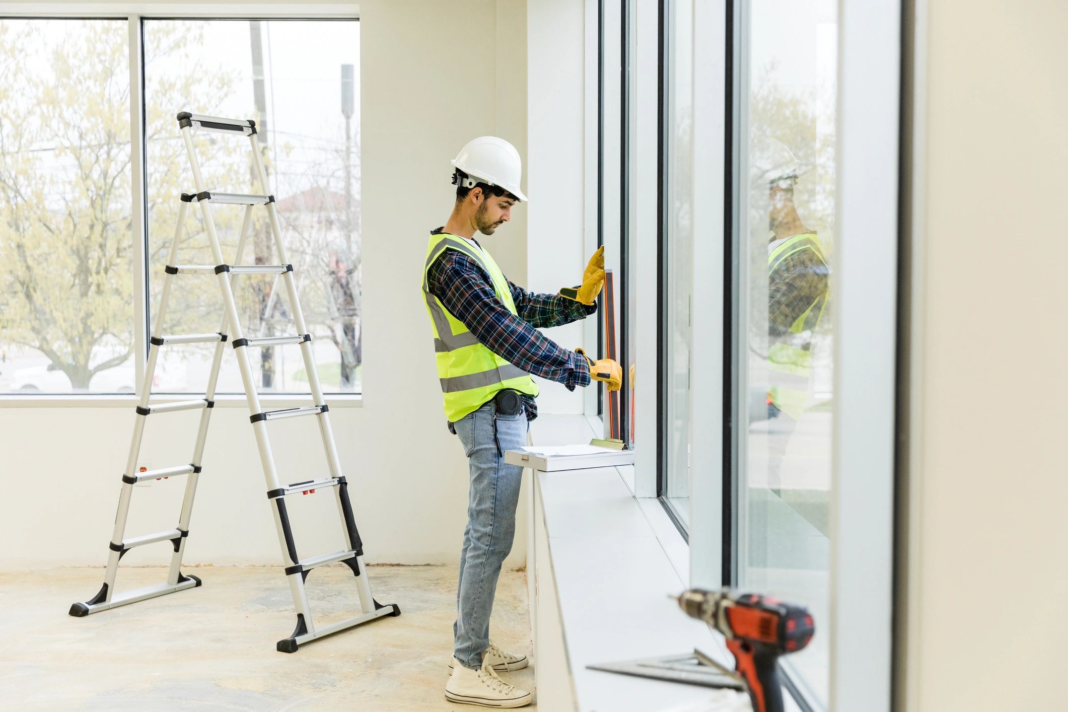 Professional installer working on a building project